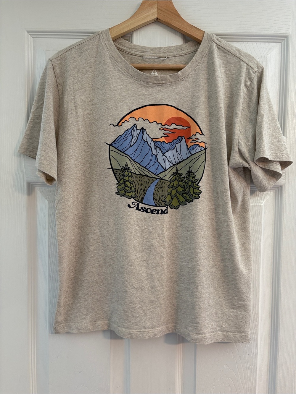 Ascend Gray Tee with Orange Sunset Mountain Graphic
Size: Medium